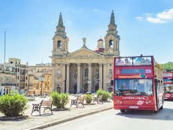 A red, double-decker bus in Malta