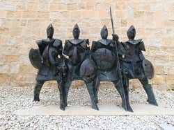 A black sculpture of the famous Knights of the Order