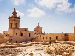 An ancient town made from stone on a sunny day