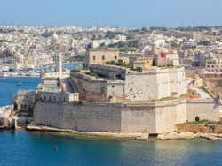 A panoramic view of the Fort of Saint Elmo with the city behind it