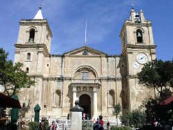 The façade of the cathedral with a blue sky overhead