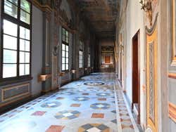 Looking down a long, beautifully decorated hallway