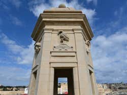 A stone watchtower seen from a low angle